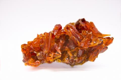  Zincite mineral isolated against a white background