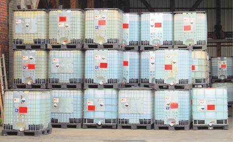 Chemical containers in warehouse