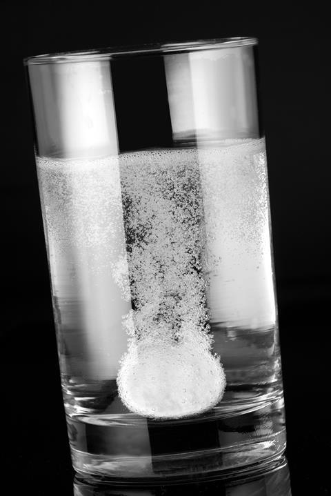 Anti-acid tablet dissolving in water
