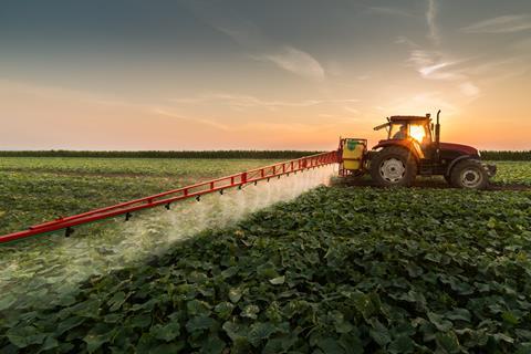 Tractor spraying