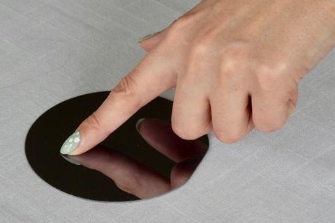 Finger touching a surface