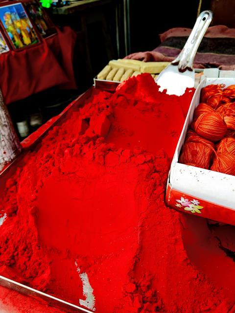 Red, maroon powder of vermilion