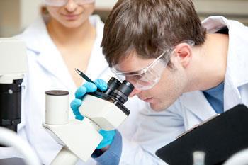 male-scientist-with-microscope_shutterstock_350