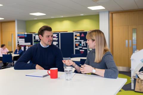 A photograph showing a mentor and a mentee