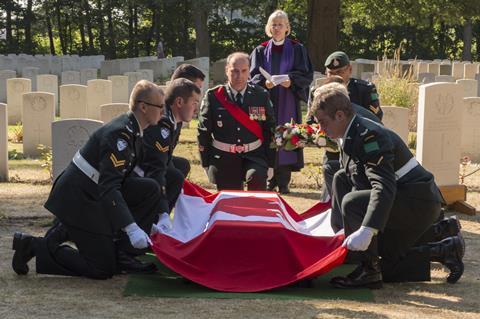 An image showing soldier remains being laid to rest