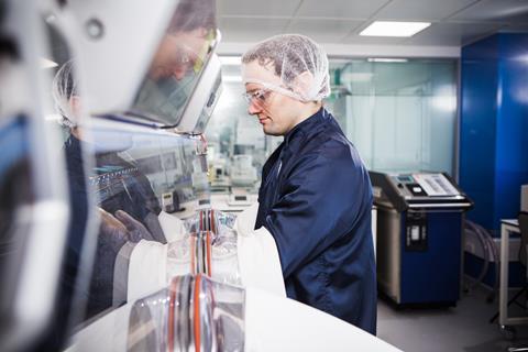 Researcher working in the Cell and Gene Therapy Catapult manufacturing centre