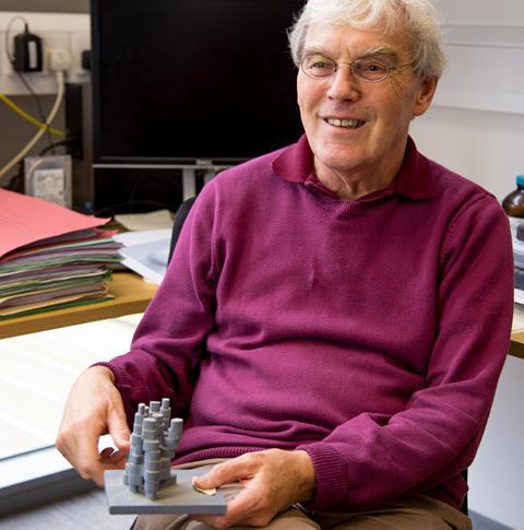 Richard Henderson with a molecular model of bacterial rhodopsin