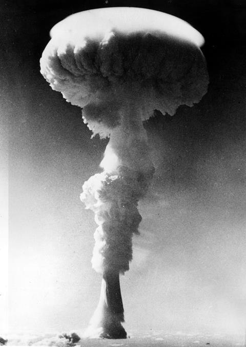 A mushroom cloud rises over the Pacific Ocean following the detonation of Britain's first H-bomb near Christmas Island