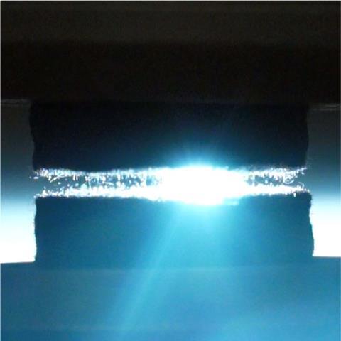 A bright light along a line on a blue background
