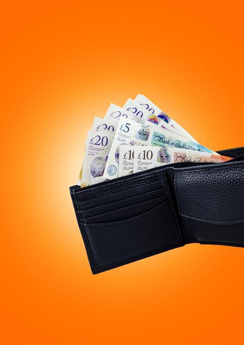 An image showing money in a wallet