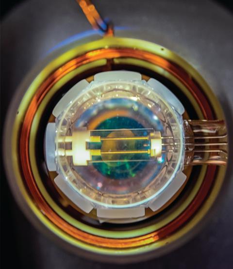 The transparent electrodes used to manipulate polar KRb molecules confined by an optical lattice inside an ultrahigh vacuum cell