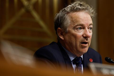 A photo of Senator Rand Paul sitting on a committee hearing in the senate