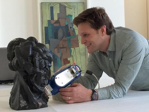 Caption: Marc Walton, co-director of Northwestern University/Art Institute of Chicago Center for Scientific Studies in the Arts (NU-ACCESS), uses portable equipment for elemental analysis of the alloy of Pablo Picasso, Tête de femme (Fernande), Paris, aut