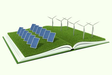 An image showing solar panels and wind turbines on a book