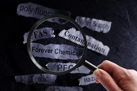An image showing a magnifying glass hovering over newspaper cuttings about PFAS, contamination, forever chemicals and PFOA