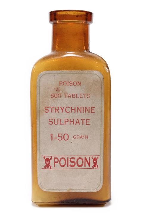 An antique amber bottle of Strychnine poison