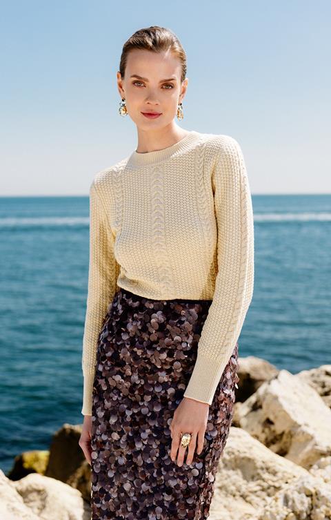 Model wearing sweater made out of yeast