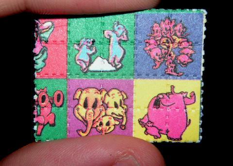 'Pink Elephants on Parade' LSD blotter