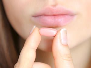 Lady holding a flibanserin pill