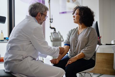 Female patient in consultation with doctor as part of a clinical trial