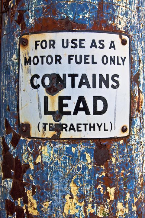 This early 1900's fuel pump has a warning sign saying for use as a motor fuel only 