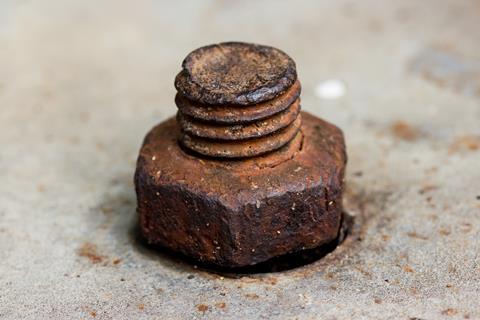 rusted bolt on concrete