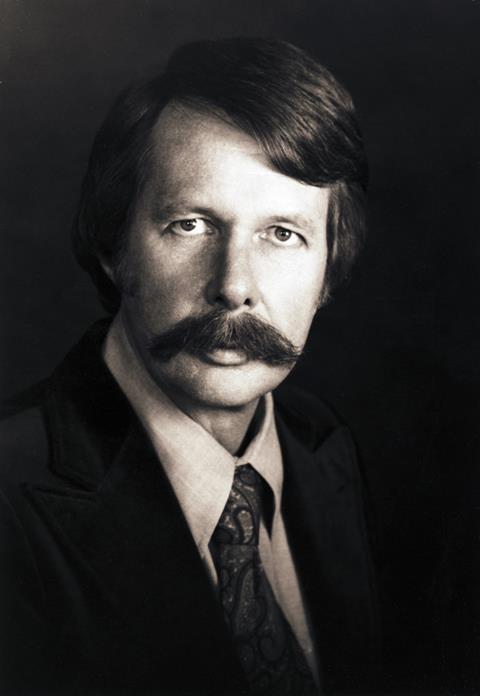 Portrait photo of  chemist John Stille