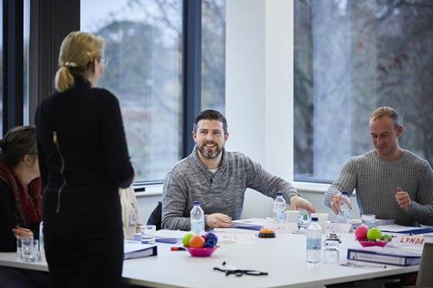 A group of people at a workshop-style meeting