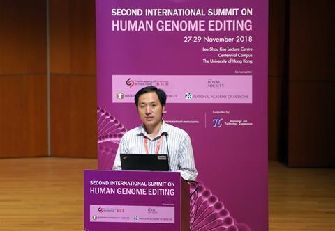 An image of He Jiankui at the Second International Summit on Human Genome Editing