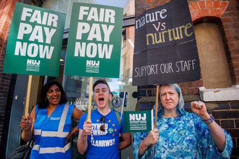 People protest on picket lines for fair pay
