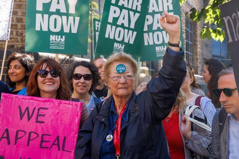 People protest on picket lines for fair pay