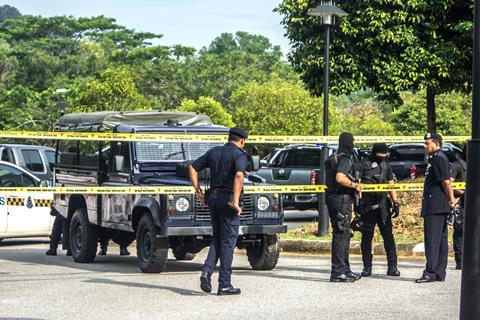 Police operate strict controls at the Sepang Court Complex during the high profile murder of Kim Jong Nam  Sepang  Malaysia