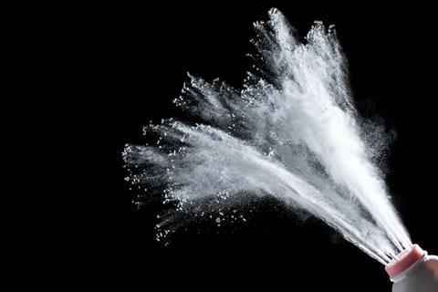 Plume de talco em pó