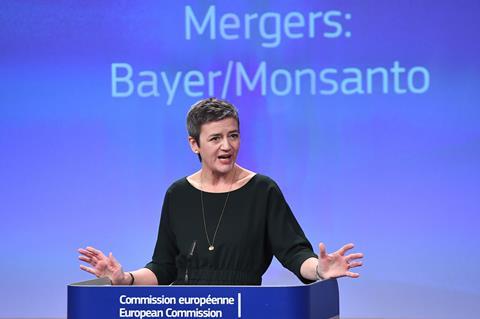 A picture of Margrethe Vestager at a press conference on the Bayer/Monsanto Merger