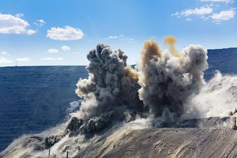 An explosion in an open cast mining quarry