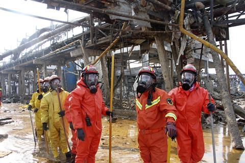An image showing firefighters working on the rubble of a chemical factory after the explosion in Yancheng