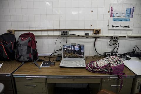 An image showing a laptop and backpacks sitting inside the chemistry lab at the Simon Bolivar University campus in Caracas, Venezuela