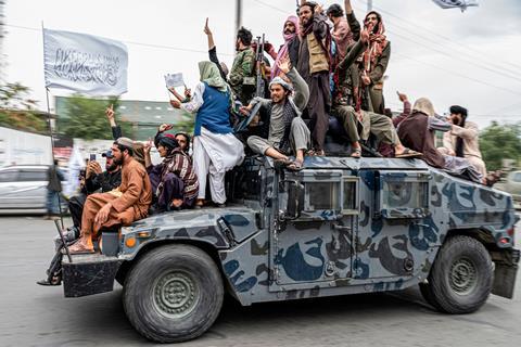 Taliban fighters on a ride in Kabul