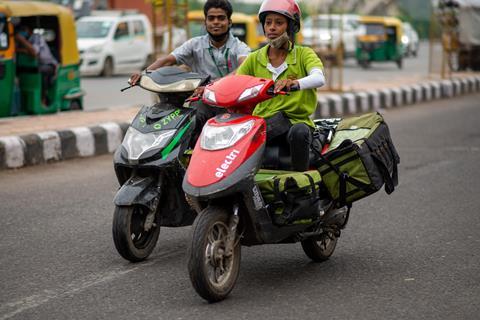 Riders on eScooters in India