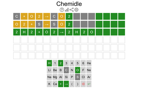 Screenshot of the Chemidle game interface. The top section shows a chemical equation with coloured tiles indicating correctness. Below is a grid for entering guesses, and at the bottom is a keyboard styled like a periodic table