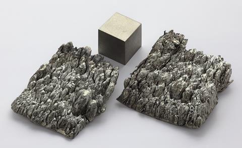 Scandium, sublimed-dendritic, high purity 99.998% Sc/TREM. As well as an argon arc remelted 1cm^3 scandium cube for comparison.