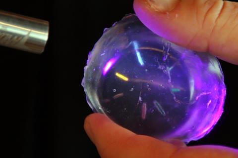 Profusa's implanted sensors fluoresce under UV light