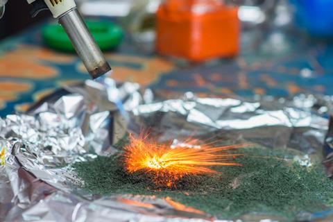 chemical reaction of ammonium dichromate if to set fire to it on the foil 