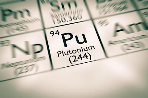 An image in soft focus, showing the element plutonium on the periodic table