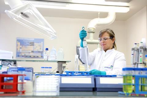 Image shows people at work in a Umicore lab in Hoboken, Belgium 