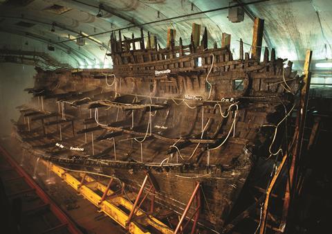 The hull of the Mary Rose, being preserved in a museum