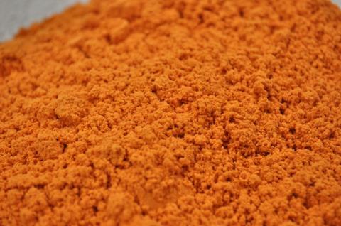 Orange dye particles