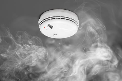 A photograph of a smoke detector