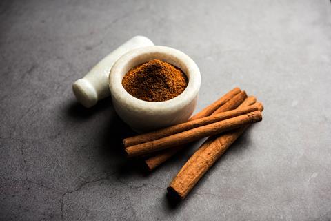 Dried cinnamon sticks and powdered cinnamon