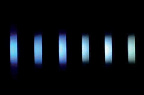 Fluorescence photographs of NP4C solutions in combination with multiple conditions including temperature, solvent polarity and β-CD